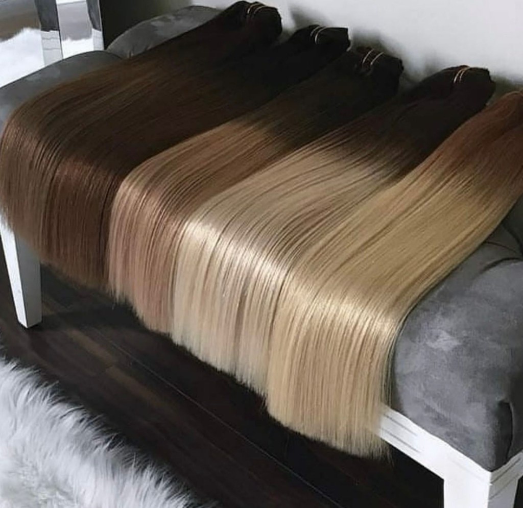 Premium hair extension wefts in multiple shades