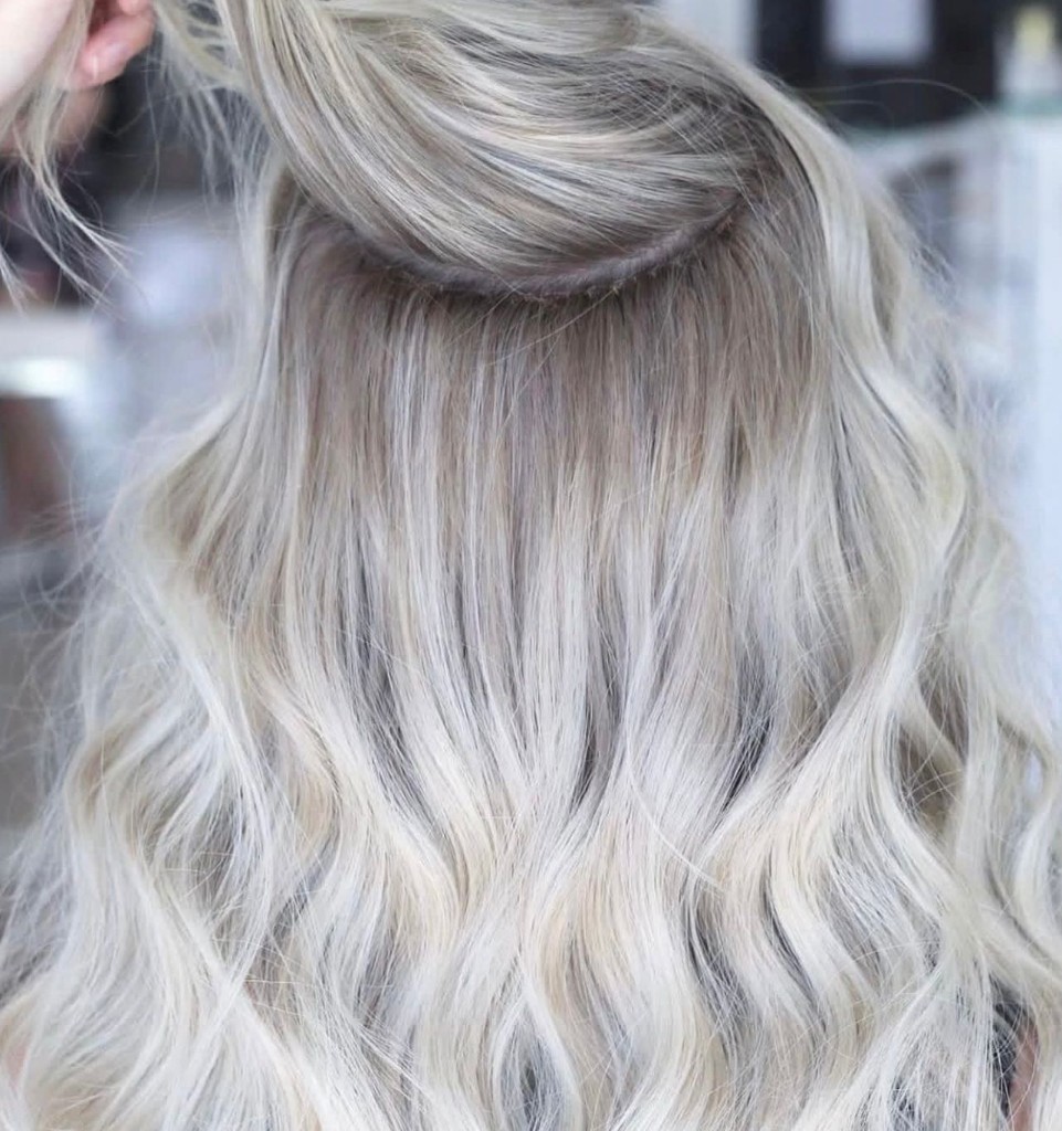 Beaded row extension with dimensional ash blonde waves